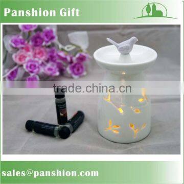 Cut out white ceramic aroma burner