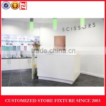 White cash wrap counter for store