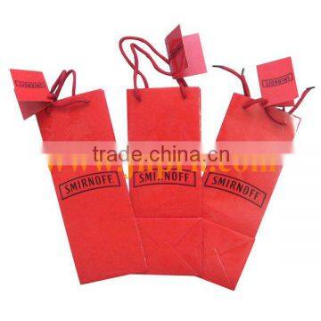 Red small gifts paper bags with hand tags
