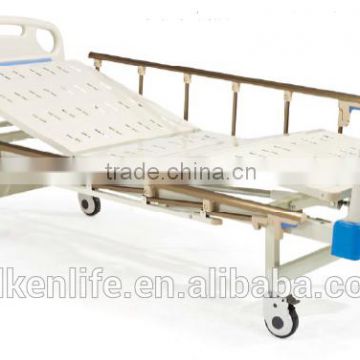 Hospital bed with two revolving levers