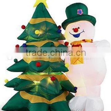 Inflatable snowman and tree