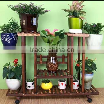China factory wholesale antique wooden plant stand with wheels