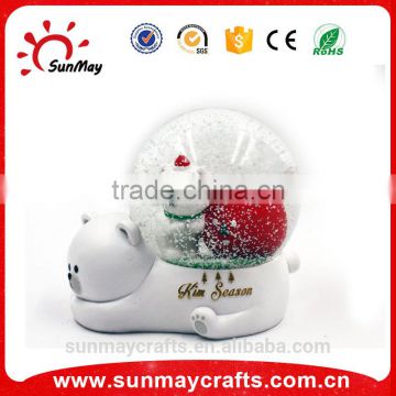 Wholesale custom acrylic Christmas snow globe for sale