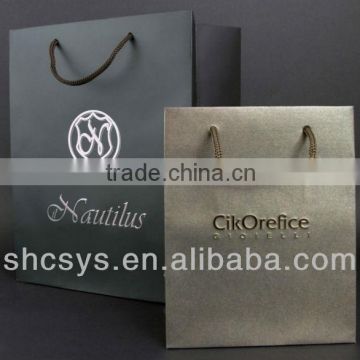 AEP 2013 New style boutique paper bag for customized brand with Embossing and Engraving technology