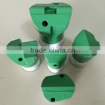 Tungsten carbide rotary rock drill bits for drilling machines