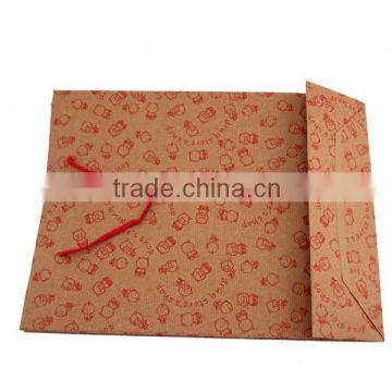 Flat bottom kraft paper bag with small red pig design