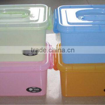 Colorful plastic storage bins with wheels for sundries