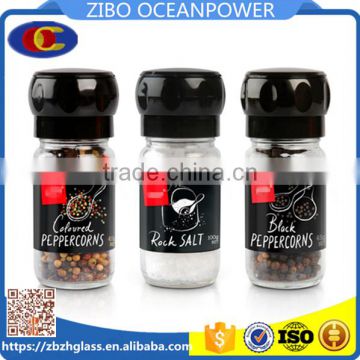 Clear Glass spice grinder/pepper mill with black plastic lid