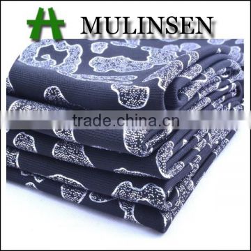 Shaoxing knit polyester 118D FDY black dyed silver stamping stretch fabric for dress