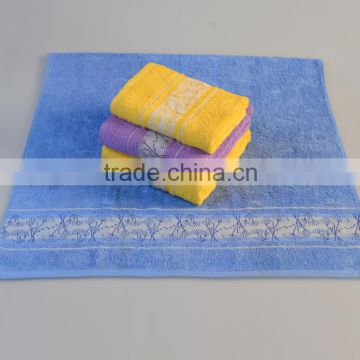 Wholesale cheap solid colour jacquard 100% cotton bath towel