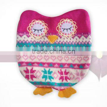 hot water bottle with owl knitted cover