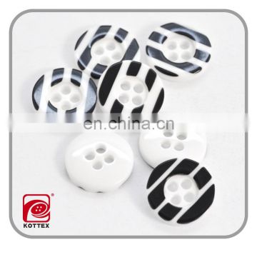 24L, a plain black and white stripe and a resin button for a brightly colored shirt.
