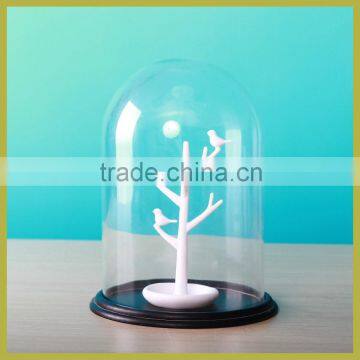 glass dome display with black base