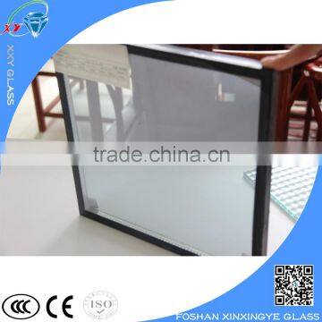 Unbreakable insulated glass garage door panel