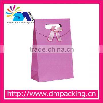 lavender color gift paper bag with die cut handle