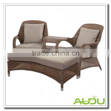 Audu Rattan Winchester love seat and footstool