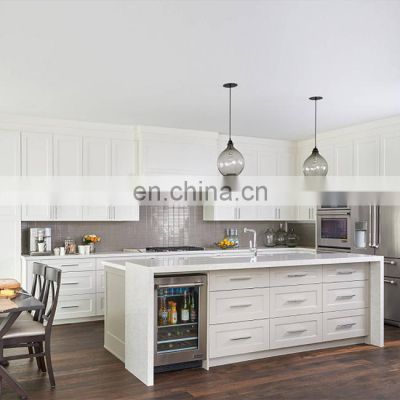 White shaker modern layout design bespoke pantry storage wood slat kitchen cabinetry