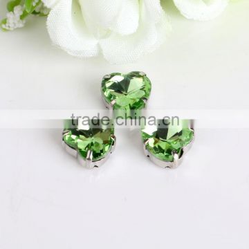machine cut peridot green color heart shape sew on crystal stone in claw for women dresses