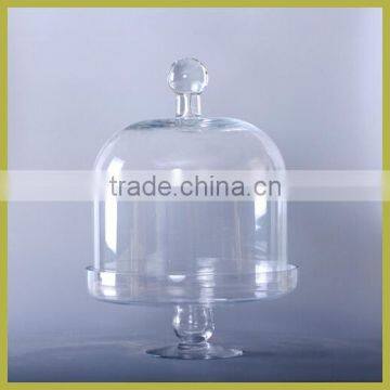 clear glass dome with large stand
