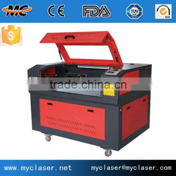 MC9060 Convenient portable co2 laser cutting stone engraving machine price with CE FDA