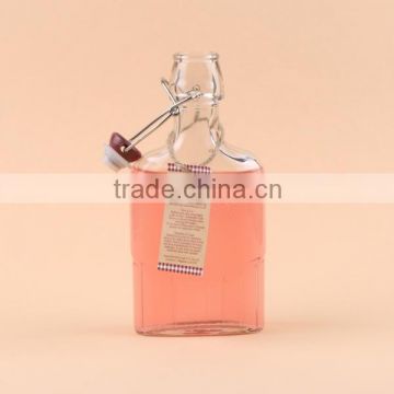 Flat shape glass bottle with plastic clamp lid                        
                                                Quality Choice