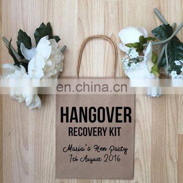 Personalised kraft paper hangover recovery kit bag