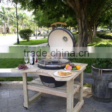 kamado charcoal grill with curved shape table