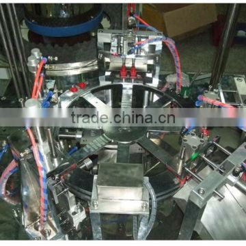 induction seal inserting machine