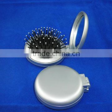 mirror with comb