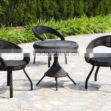 Garden rattan chairs with tea table