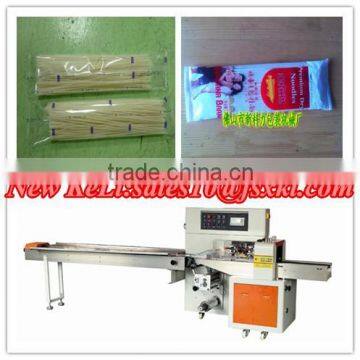 Dry noodles flow wrapping machine