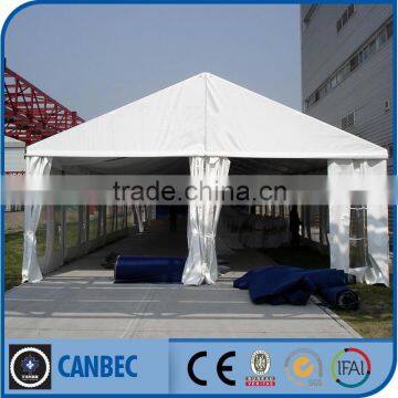 tent with tables and chairs for event