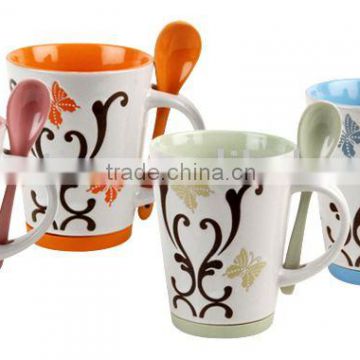 Ceramic coffee mug with spoon and silicon base