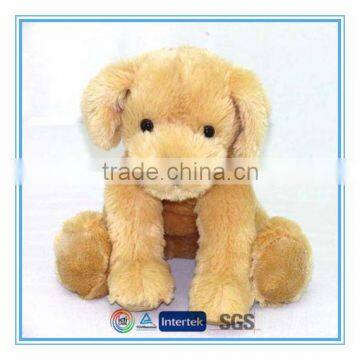 Plush dog toy brown sitting puppy