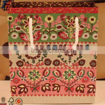 Very popular exquisite Eco-friendly paper bags with handles wholesale