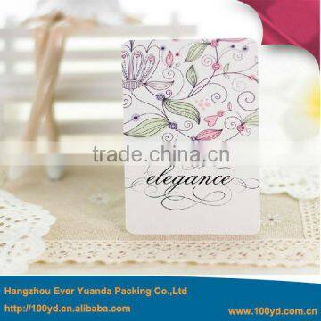 woman garment clothing hang tag