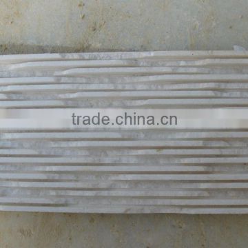 White marble comb chiseled