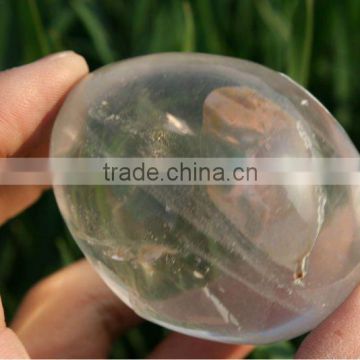 Unique Quartz Crystal Egg Within Natural Pattern of Smiling Young Lady