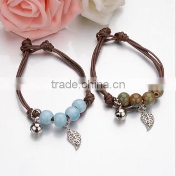 Small bell and leaf charms double layers cord bracelets lucky love couple leaf charm bracelets jewelry wholesale 2017