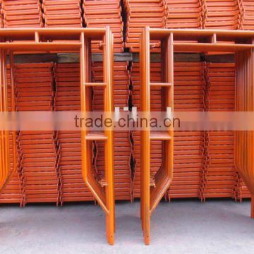 orange painted door type steel scaffolding