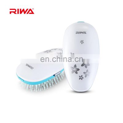 Electric 2XAAA batteries operated Ionic massaging hair brush for personal care