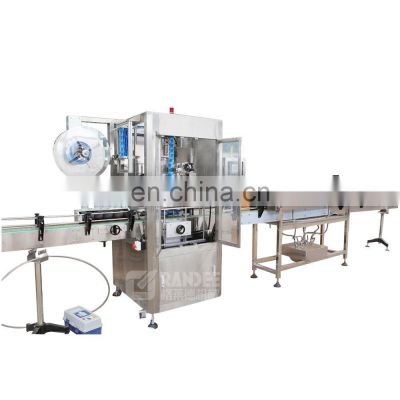 Auto packaging and labeling machine for plastic bottle heat shrink cap seal machine