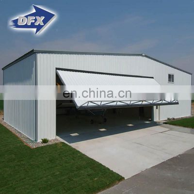 Qingdao pre engineering industrial steel hangar portal frame design building with sliding hangar doors