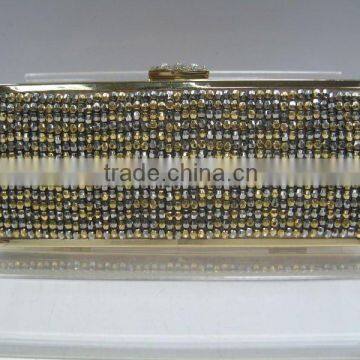 handmade stripy beaded clutch bag