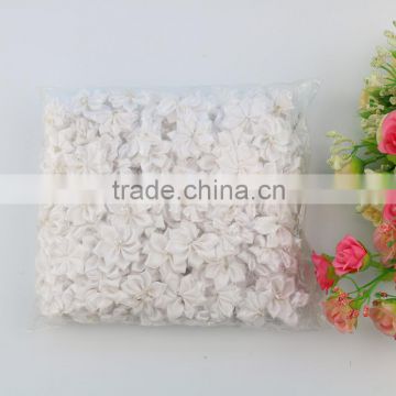 Hot selling small satin ribbon flowers with pearl centra