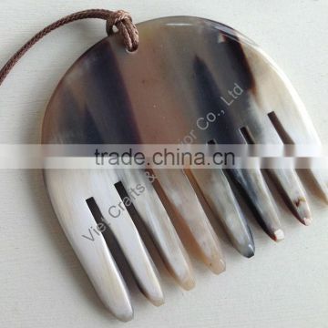 Buffalo horn comb 9.6 x 9.4cm with string