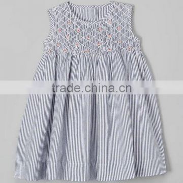 Woven cotton stripe smocked sleeveless girl dress