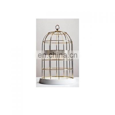 golden shiny metal bird cage