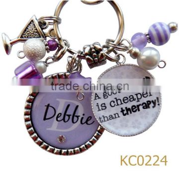 hot selling products in china cross souvenir metal keychain maker