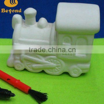 Small car shaped for DIY ceramic product by painting with brush and paint